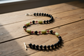 Beaded necklace on a wooden surface